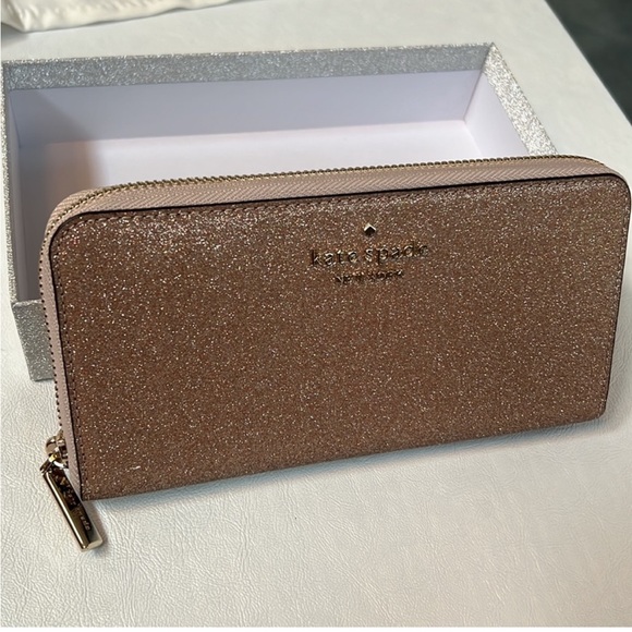 kate spade Handbags - KATE SPADE ROSE GOLD GLITTERED WALLET!